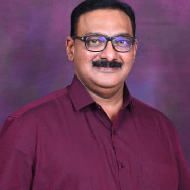 Portrait of SRI. K. M. JYOTHI PRAKASH, Director at DHUSBN